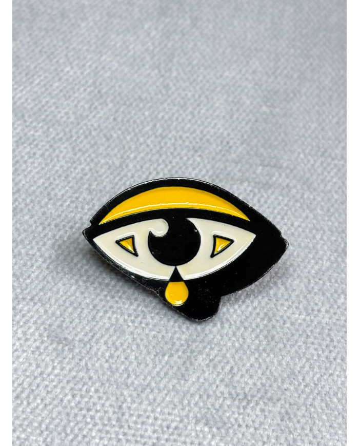 Pin ojo amarillo